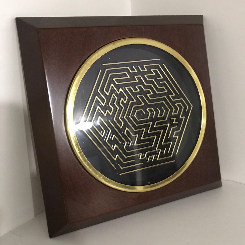 Vintage maze puzzle ball game on wood frame
